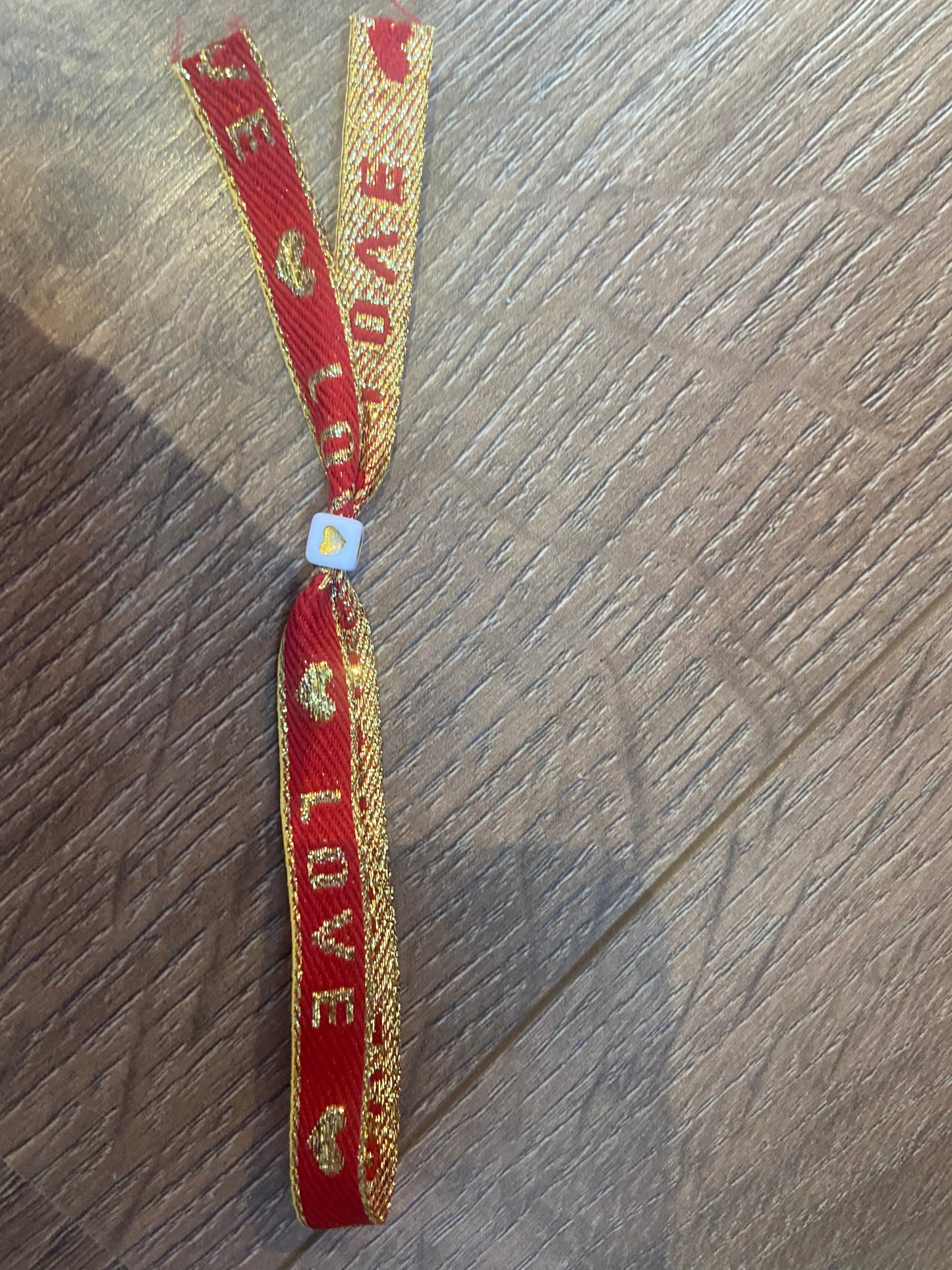 Lint armbandje love goud