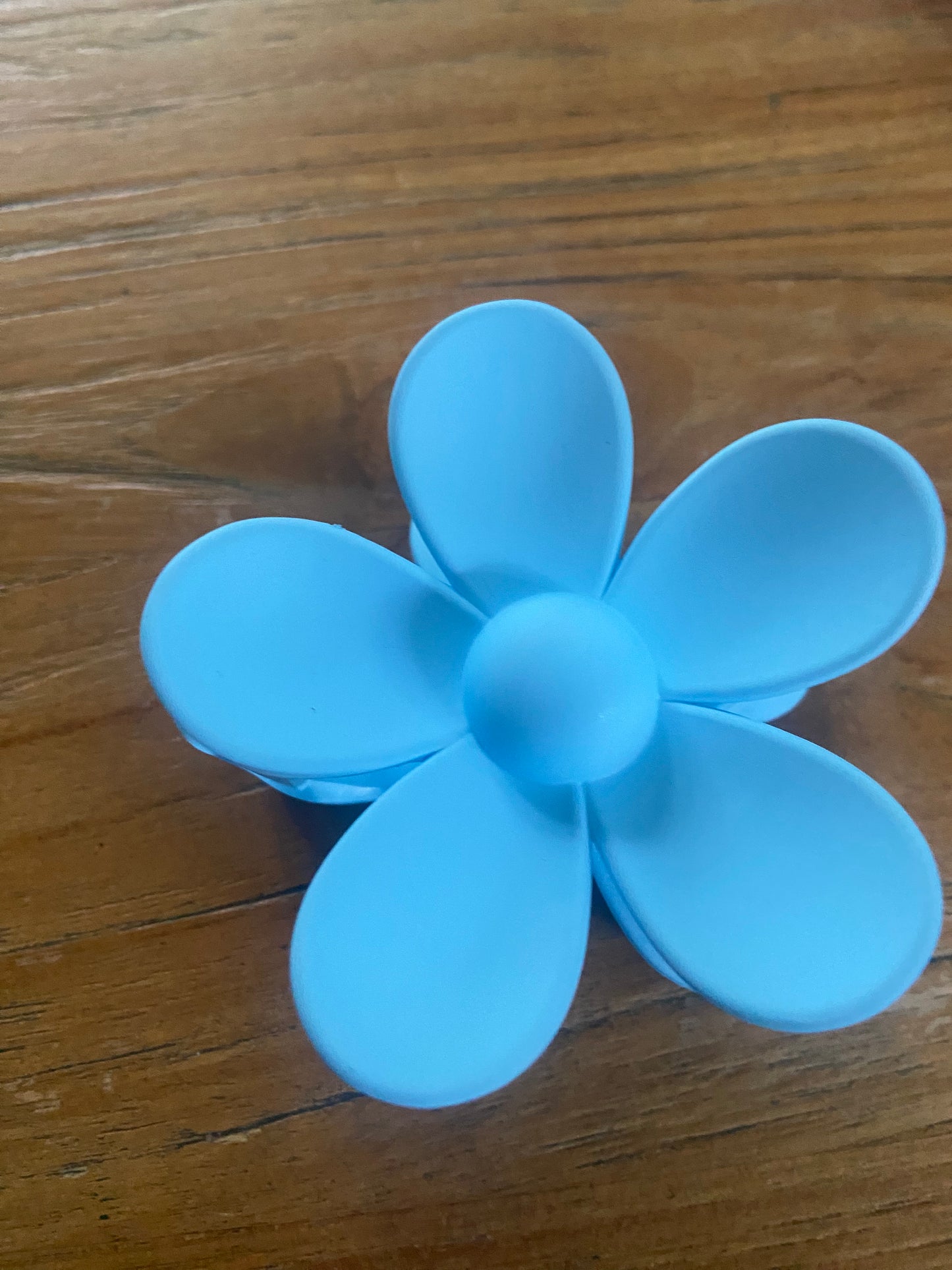 Bloemen haarclip blauw