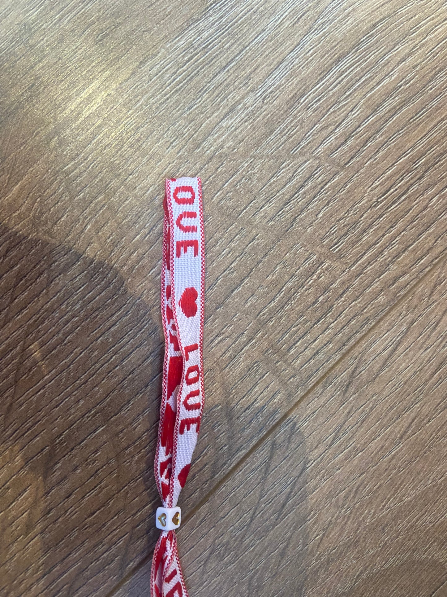 Lint armbandje love wit